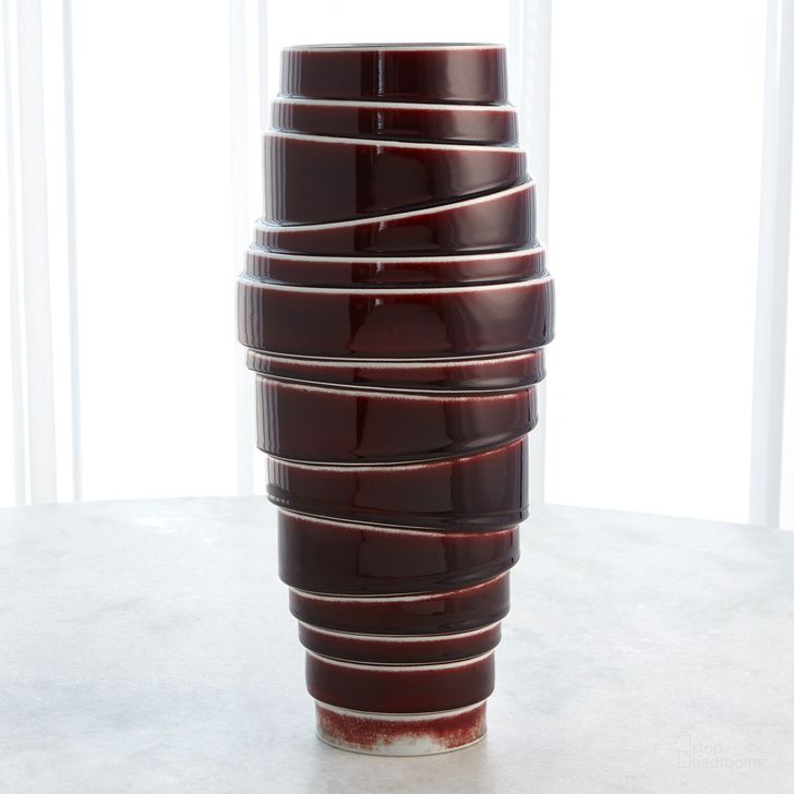 The appearance of Layered Tall Vase In Oxblood designed by Global Views in the modern / contemporary interior design. This red piece of furniture  was selected by 1StopBedrooms from Layered Collection to add a touch of cosiness and style into your home. Sku: 1.10833. Material: Porcelain. Product Type: Vase. Image1