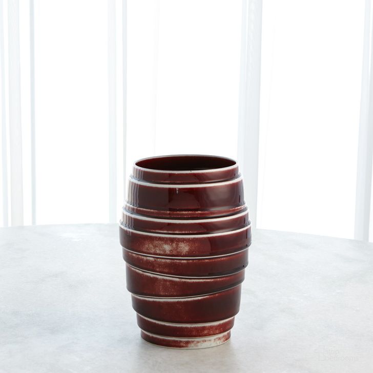 The appearance of Layered Wide Vase In Oxblood designed by Global Views in the modern / contemporary interior design. This red piece of furniture  was selected by 1StopBedrooms from Layered Collection to add a touch of cosiness and style into your home. Sku: 1.10834. Material: Porcelain. Product Type: Vase. Image1