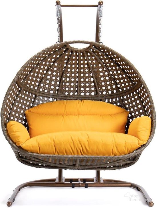 The appearance of LeisureMod Amber Wicker Hanging Double Egg Swing Chair designed by LeisureMod in the modern / contemporary interior design. This amber piece of furniture  was selected by 1StopBedrooms from  to add a touch of cosiness and style into your home. Sku: EKDBG-57A. Product Type: Outdoor Chair. Material: Wicker. Image1