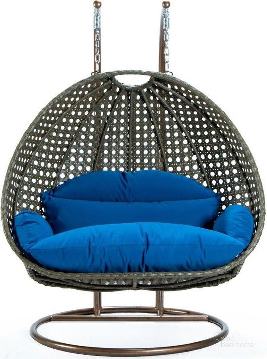 The appearance of LeisureMod Blue Wicker Hanging 2 person Egg Swing Chair ESCBG-57BU designed by LeisureMod in the modern / contemporary interior design. This blue piece of furniture  was selected by 1StopBedrooms from  to add a touch of cosiness and style into your home. Sku: ESCBG-57BU. Product Type: Outdoor Chair. Material: Wicker. Image1