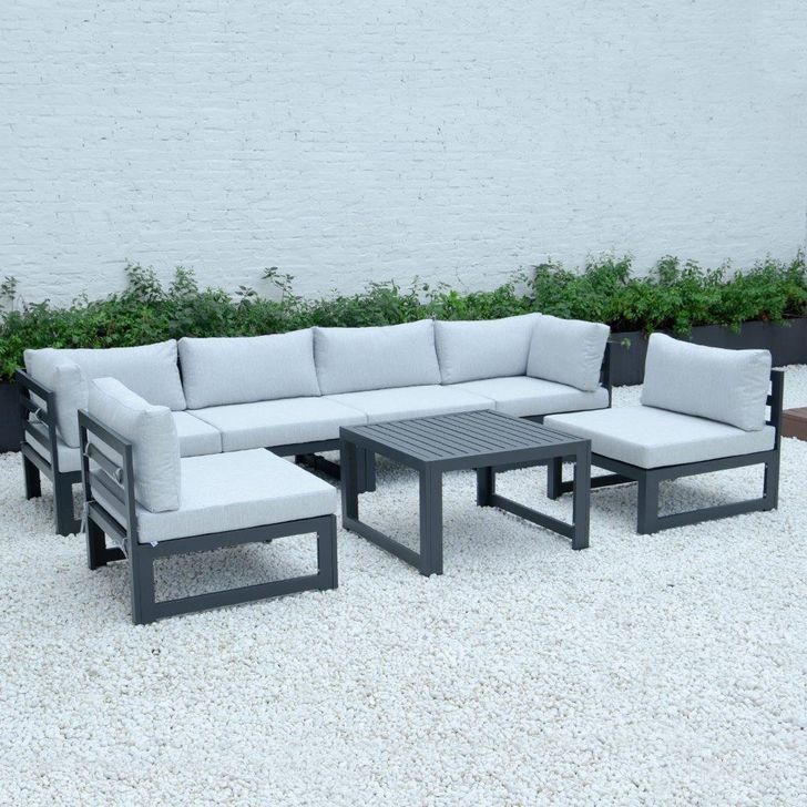 The appearance of Leisuremod Chelsea 7-Piece Patio Sectional And Coffee Table Set With Cushions CSTBL-7LGR designed by LeisureMod in the modern / contemporary interior design. This light grey piece of furniture  was selected by 1StopBedrooms from Chelsea Collection to add a touch of cosiness and style into your home. Sku: CSTBL-7LGR. Material: Aluminum. Product Type: Outdoor Sectional. Image1