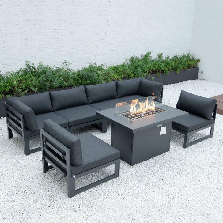 The appearance of Leisuremod Chelsea 7-Piece Patio Sectional And Fire Pit Table CSFBL-7BL designed by LeisureMod in the modern / contemporary interior design. This black piece of furniture  was selected by 1StopBedrooms from Chelsea Collection to add a touch of cosiness and style into your home. Sku: CSFBL-7BL. Material: Aluminum. Product Type: Outdoor Sectional. Image1