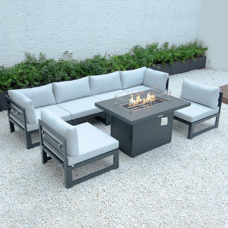 The appearance of Leisuremod Chelsea 7-Piece Patio Sectional And Fire Pit Table CSFBL-7LGR designed by LeisureMod in the modern / contemporary interior design. This light grey piece of furniture  was selected by 1StopBedrooms from Chelsea Collection to add a touch of cosiness and style into your home. Sku: CSFBL-7LGR. Material: Aluminum. Product Type: Outdoor Sectional. Image1
