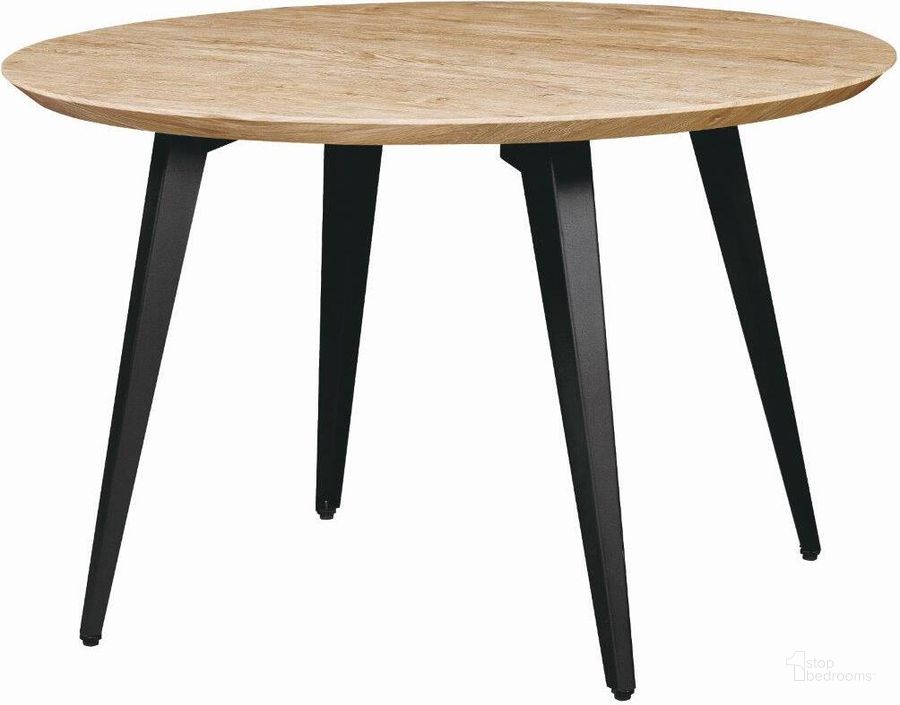The appearance of Leisuremod Ravenna Modern Round Wood 47 Inch Dining Table With Metal Legs RTM47BN designed by LeisureMod in the modern / contemporary interior design. This butternut piece of furniture  was selected by 1StopBedrooms from Ravenna Collection to add a touch of cosiness and style into your home. Sku: RTM47BN. Table Base Style: Legs. Table Top Shape: Round. Material: Metal. Product Type: Dining Table. Size: 47". Image1