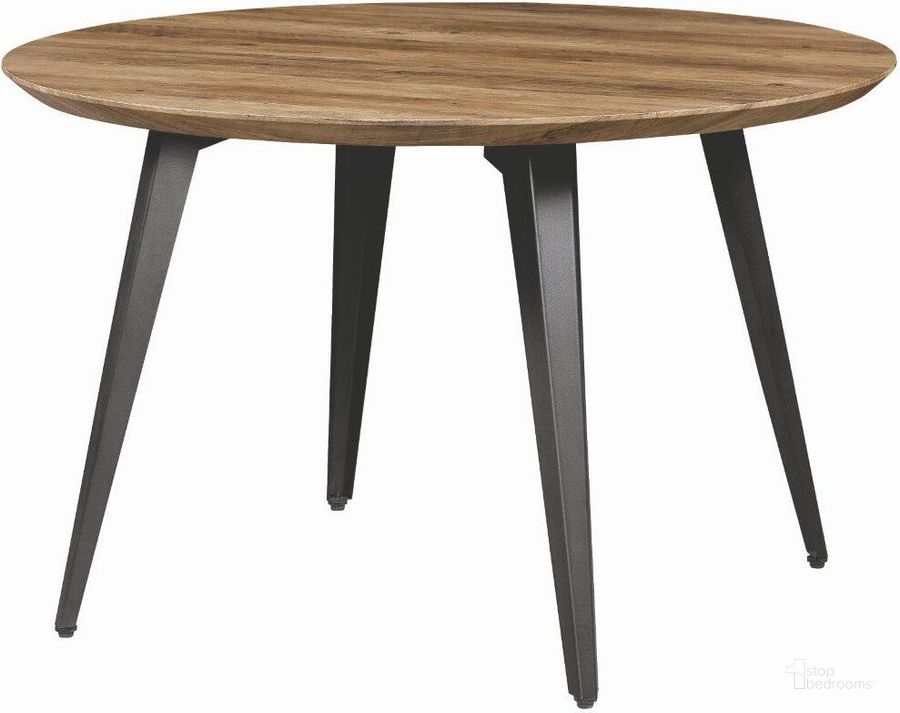 The appearance of Leisuremod Ravenna Modern Round Wood 47 Inch Dining Table With Metal Legs RTM47BR designed by LeisureMod in the modern / contemporary interior design. This dark brown piece of furniture  was selected by 1StopBedrooms from Ravenna Collection to add a touch of cosiness and style into your home. Sku: RTM47BR. Table Base Style: Legs. Table Top Shape: Round. Material: Metal. Product Type: Dining Table. Size: 47". Image1