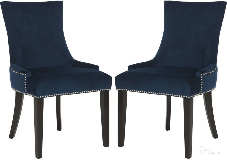 The appearance of Lester Navy Dining Chair with Silver Nailhead Detail Set of 2 designed by Safavieh in the traditional interior design. This dark navy piece of furniture  was selected by 1StopBedrooms from Lester Collection to add a touch of cosiness and style into your home. Sku: MCR4709L-SET2. Product Type: Dining Chair. Material: Stainless Steel. Image1