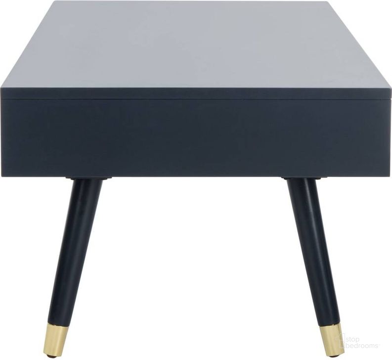 The appearance of Levinson Navy Gold Cap Coffee Table designed by Safavieh in the modern / contemporary interior design. This gold navy piece of furniture  was selected by 1StopBedrooms from Levinson Collection to add a touch of cosiness and style into your home. Sku: FOX6304C. Product Type: Coffee Table. Material: Brass. Image1