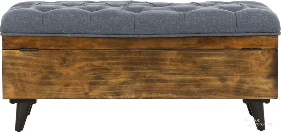 The appearance of Liam Navy and Dark Oak Tufted Cocktail Ottoman designed by Safavieh in the modern / contemporary interior design. This navy piece of furniture  was selected by 1StopBedrooms from Liam Collection to add a touch of cosiness and style into your home. Sku: OTT6400B. Material: Wood. Product Type: Ottoman. Image1