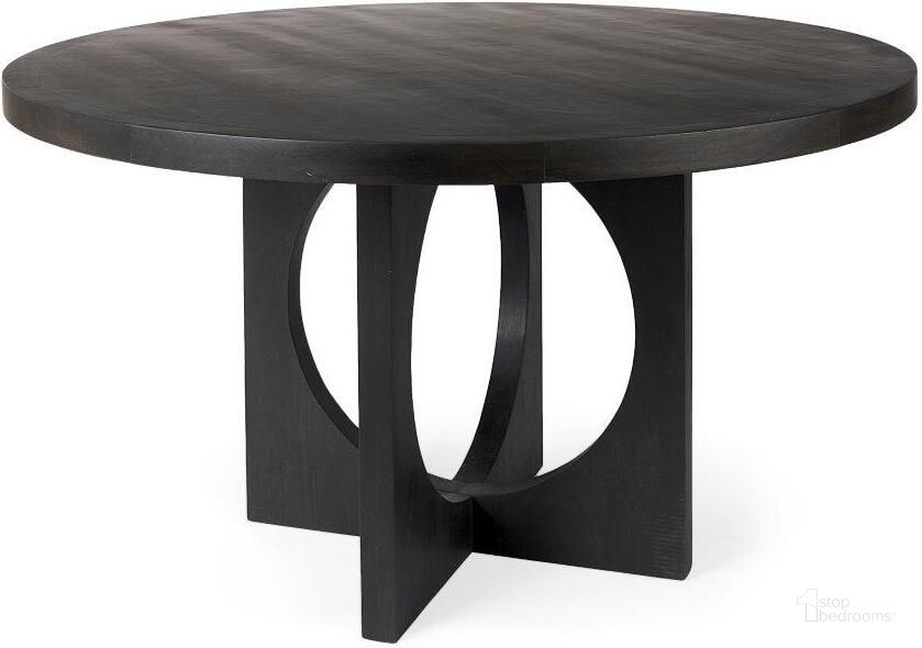 The appearance of Liesl Black Wood With Circular Top Dining Table designed by Mercana in the modern / contemporary interior design. This black piece of furniture  was selected by 1StopBedrooms from Liesl Collection to add a touch of cosiness and style into your home. Sku: 69185. Table Base Style: Pedestal. Table Top Shape: Round. Material: Wood. Product Type: Dining Table. Size: 54". Image1