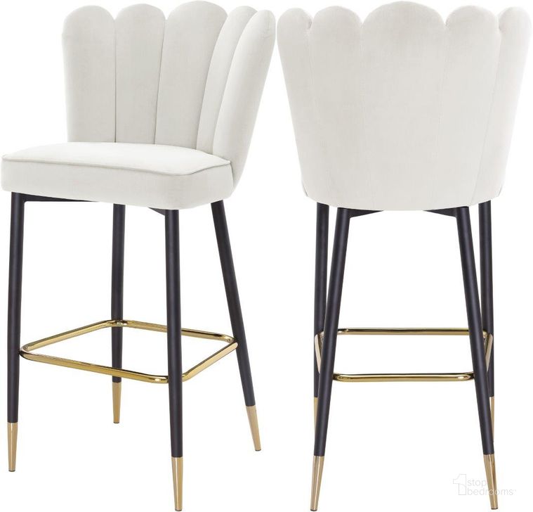 The appearance of Lily Cream Velvet Stool Set of 2 designed by Meridian in the modern / contemporary interior design. This cream velvet piece of furniture  was selected by 1StopBedrooms from Lily Collection to add a touch of cosiness and style into your home. Sku: 961Cream-C. Product Type: Counter Height Chair. Material: Velvet. Image1
