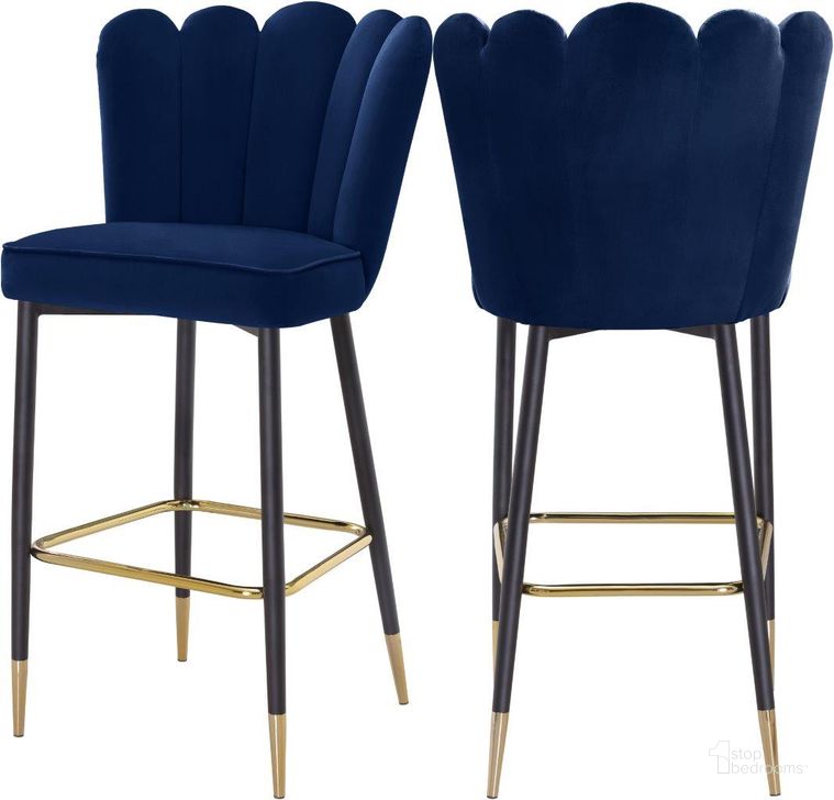 The appearance of Lily Navy Velvet Stool Set of 2 designed by Meridian in the modern / contemporary interior design. This navy velvet piece of furniture  was selected by 1StopBedrooms from Lily Collection to add a touch of cosiness and style into your home. Sku: 961Navy-C. Product Type: Counter Height Chair. Material: Velvet. Image1