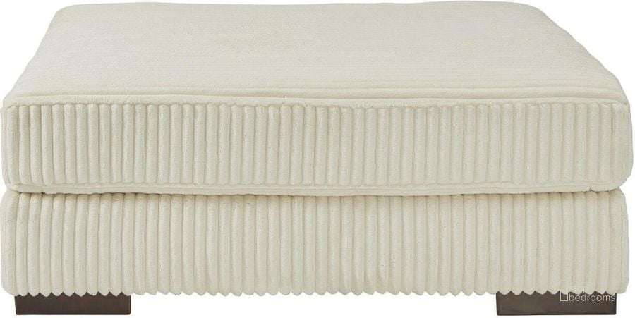 The appearance of Lindyn Oversized Accent Ottoman In Ivory designed by Signature Design by Ashley in the modern / contemporary interior design. This ivory piece of furniture  was selected by 1StopBedrooms from Lindyn Collection to add a touch of cosiness and style into your home. Sku: 2110408. Material: Fabric. Product Type: Ottoman. Image1