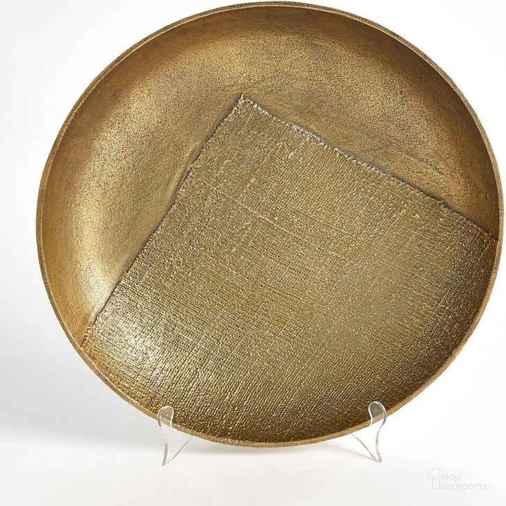 The appearance of Linen Round Large Tray In Brass designed by Global Views in the modern / contemporary interior design. This brass piece of furniture  was selected by 1StopBedrooms from Linen Collection to add a touch of cosiness and style into your home. Sku: 7.91429. Product Type: Tray. Material: Aluminium. Image1