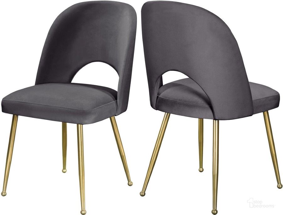 The appearance of Logan Grey Velvet Dining Chair Set of 2 designed by Meridian in the modern / contemporary interior design. This grey velvet piece of furniture  was selected by 1StopBedrooms from Logan Collection to add a touch of cosiness and style into your home. Sku: 990Grey-C. Material: Fabric. Product Type: Dining Chair. Image1