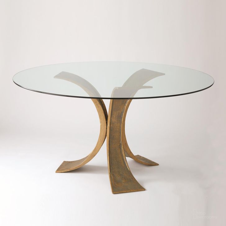 The appearance of Lotus Dining Table With 48 Inch Glass Top In Antique Gold And Bronze designed by Global Views in the modern / contemporary interior design. This gold piece of furniture  was selected by 1StopBedrooms from Lotus Collection to add a touch of cosiness and style into your home. Sku: 7.80561. Table Base Style: Pedestal. Table Top Shape: Round. Product Type: Dining Table. Material: Iron. Size: 48". Image1