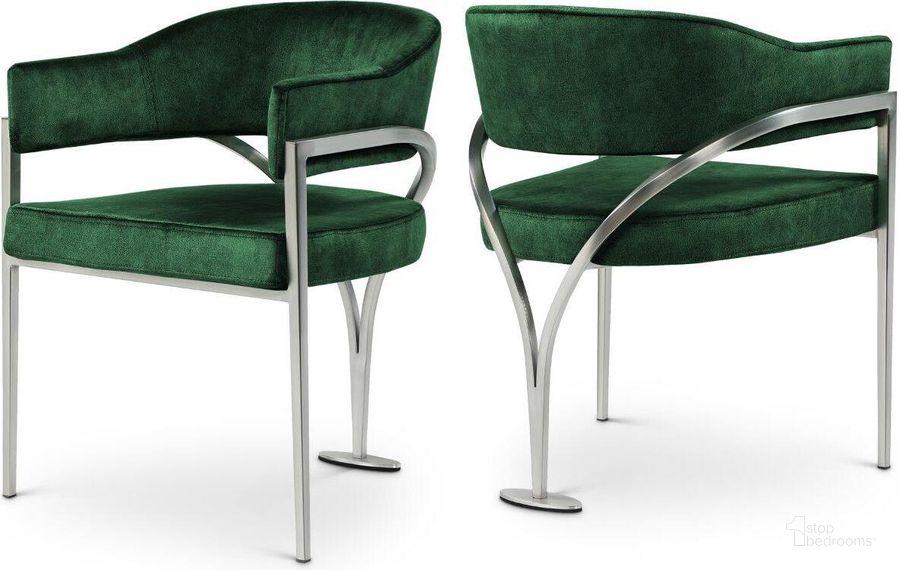 The appearance of Madelyn Green Velvet Dining Chair Set of 2 554Green-C designed by Meridian in the modern / contemporary interior design. This green velvet piece of furniture  was selected by 1StopBedrooms from Madelyn Collection to add a touch of cosiness and style into your home. Sku: 554Green-C. Product Type: Dining Chair. Material: Velvet. Image1