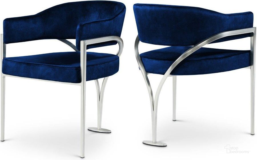 The appearance of Madelyn Navy Velvet Dining Chair Set of 2 554Navy-C designed by Meridian in the modern / contemporary interior design. This navy velvet piece of furniture  was selected by 1StopBedrooms from Madelyn Collection to add a touch of cosiness and style into your home. Sku: 554Navy-C. Product Type: Dining Chair. Material: Velvet. Image1