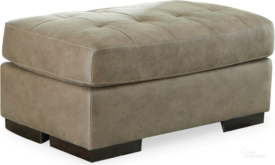 The appearance of Maderla Ottoman In Pebble designed by Signature Design by Ashley in the modern / contemporary interior design. This pebble piece of furniture  was selected by 1StopBedrooms from Maderla Collection to add a touch of cosiness and style into your home. Sku: 6200314. Material: Fabric. Product Type: Ottoman. Image1