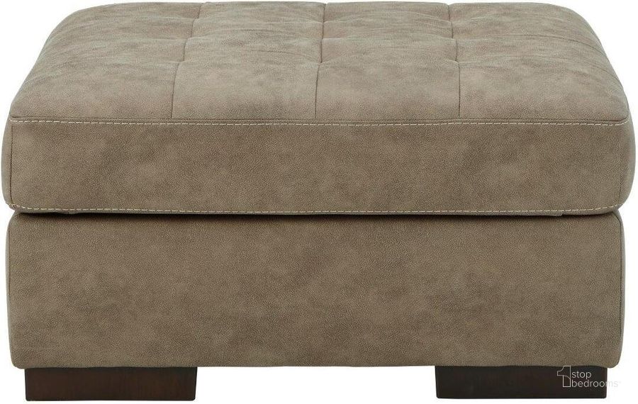 The appearance of Maderla Oversized Accent Ottoman In Pebble designed by Signature Design by Ashley in the modern / contemporary interior design. This pebble piece of furniture  was selected by 1StopBedrooms from Maderla Collection to add a touch of cosiness and style into your home. Sku: 6200308. Material: Fabric. Product Type: Ottoman. Image1