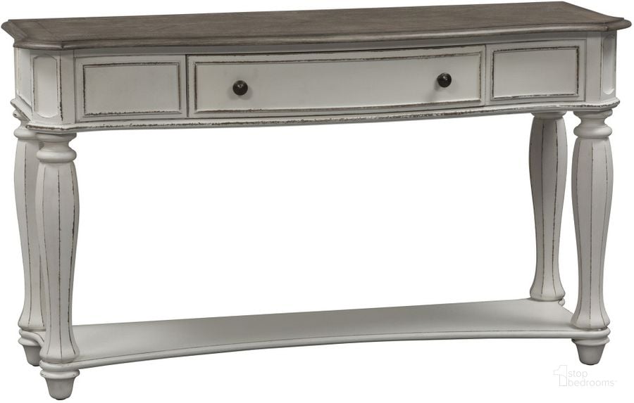 The appearance of Magnolia Manor Antique White Sofa Table designed by Liberty in the transitional interior design. This antique white piece of furniture  was selected by 1StopBedrooms from Magnolia Manor Collection to add a touch of cosiness and style into your home. Sku: 244-OT1030. Material: Wood. Product Type: Sofa Table. Table Top Shape: Rectangular. Image1