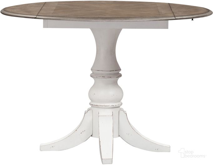 The appearance of Magnolia Manor Round Drop Leaf Dining Table designed by Liberty in the traditional interior design. This antique white piece of furniture  was selected by 1StopBedrooms from Magnolia Manor Collection to add a touch of cosiness and style into your home. Sku: 244-T4444. Table Base Style: Pedestal. Table Top Shape: Round. Product Type: Dining Table. Material: Rubberwood. Image1