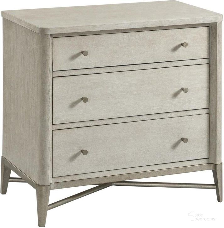 The appearance of Maisie Champagne 3 Drawer Nightstand designed by Riverside Furniture in the transitional interior design. This gray piece of furniture  was selected by 1StopBedrooms from Maisie Collection to add a touch of cosiness and style into your home. Sku: 50299. Product Type: Nightstand. Image1