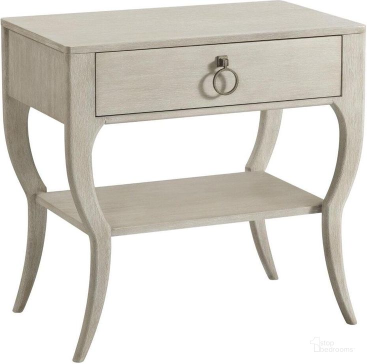 The appearance of Maisie Champagne Accent Nightstand designed by Riverside Furniture in the transitional interior design. This gray piece of furniture  was selected by 1StopBedrooms from Maisie Collection to add a touch of cosiness and style into your home. Sku: 50298. Product Type: Nightstand. Image1