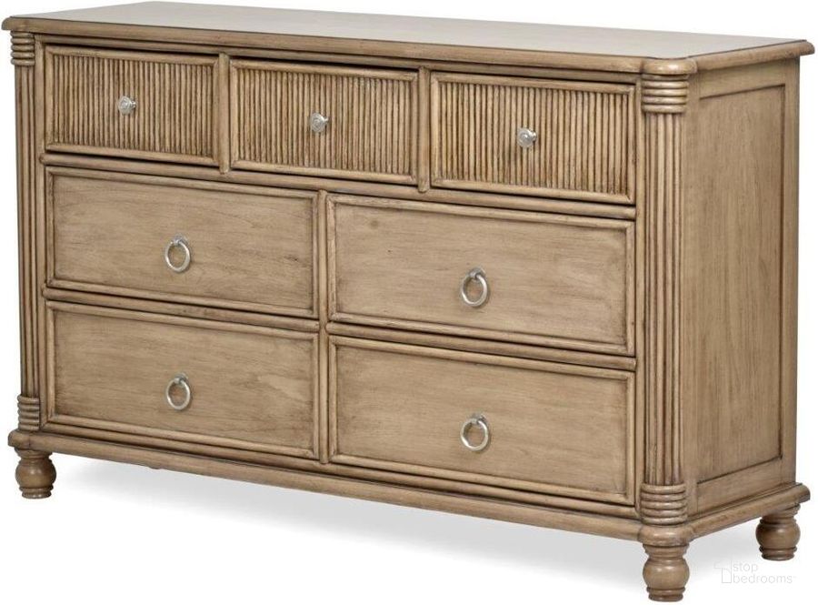 The appearance of Malibu 7 Drawer Dresser In Natural Nad Brown designed by Sea Winds Trading in the transitional interior design. This natural and brown piece of furniture  was selected by 1StopBedrooms from Malibu Collection to add a touch of cosiness and style into your home. Sku: B48437-FRAPPE. Material: Wood. Product Type: Dresser.