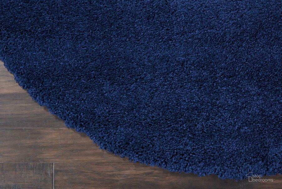 The appearance of Malibu Shag Navy 8 Round Area Rug designed by Nourison in the modern / contemporary interior design. This navy piece of furniture  was selected by 1StopBedrooms from Malibu Shag Collection to add a touch of cosiness and style into your home. Sku: 99446398376. Material: Polypropylene. Product Type: Area Rugs. Image1