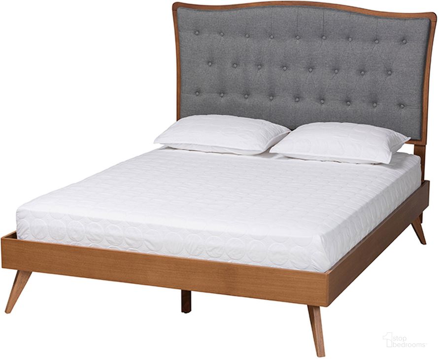 The appearance of Malle Grey Fabric and Walnut Brown Finished Wood Queen Platform Bed designed by Baxton Studio in the traditional interior design. This grey and walnut piece of furniture  was selected by 1StopBedrooms from Malle Collection to add a touch of cosiness and style into your home. Sku: MG9767/9704-Queen. Bed Type: Platform Bed. Product Type: Platform Bed. Bed Size: Queen. Material: Rubberwood. Image1