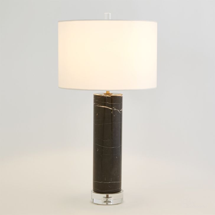 The appearance of Marble Cylinder Table Lamp In Black designed by Global Views in the modern / contemporary interior design. This black piece of furniture  was selected by 1StopBedrooms from Marble Collection to add a touch of cosiness and style into your home. Sku: 8.82977. Product Type: Table Lamp. Material: Crystal. Image1