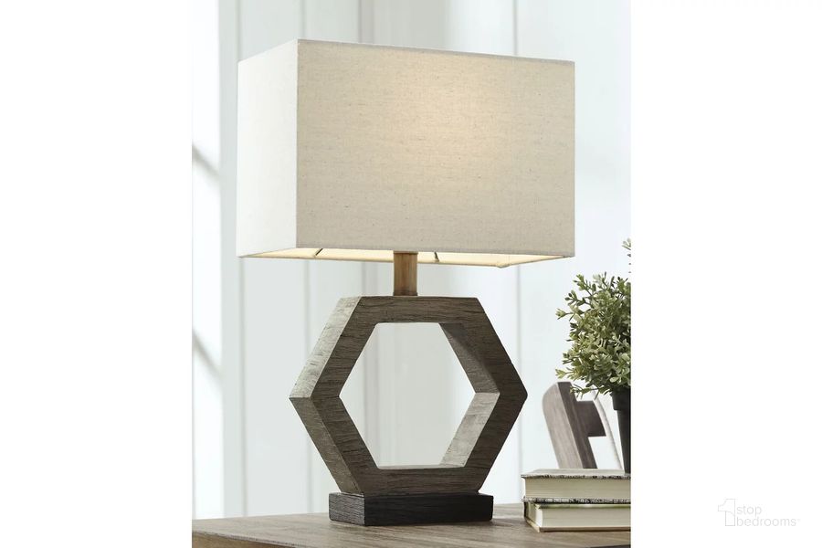 The appearance of Marilu Gray and Brown Poly Table Lamp designed by Signature Design by Ashley in the modern / contemporary interior design. This gray/brown piece of furniture  was selected by 1StopBedrooms from Marilu Collection to add a touch of cosiness and style into your home. Sku: L857764. Material: Resin. Product Type: Table Lamp. Image1