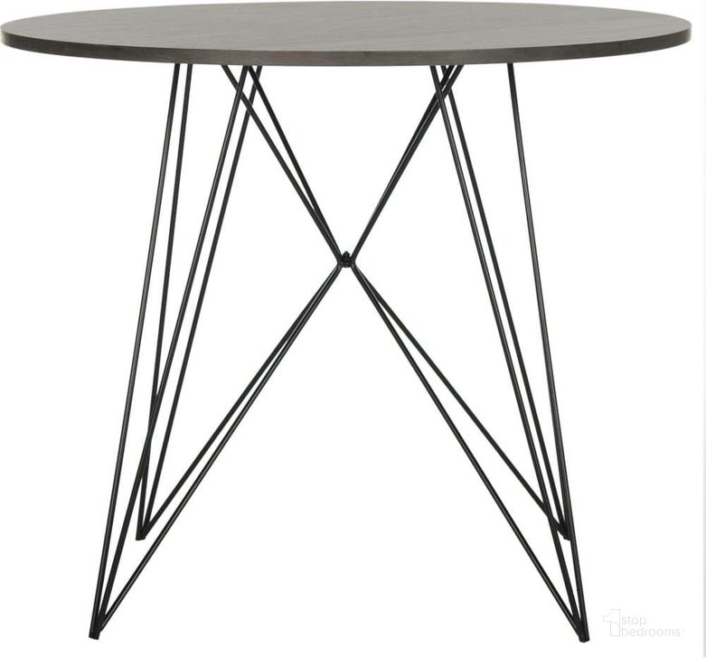 The appearance of Marino Dark Grey and Black Round Dining Table designed by Safavieh in the modern / contemporary interior design. This dark grey piece of furniture  was selected by 1StopBedrooms from Safavieh FOX Collection to add a touch of cosiness and style into your home. Sku: FOX4260A. Table Base Style: Trestle. Table Top Shape: Round. Product Type: Dining Table. Material: Iron. Size: 35". Image1