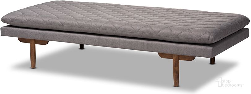 The appearance of Marit Mid-Century Modern Grey Fabric Upholstered Walnut Finished Wood Daybed designed by Baxton Studio in the transitional interior design. This grey piece of furniture  was selected by 1StopBedrooms from Marit Collection to add a touch of cosiness and style into your home. Sku: BBT6812-Grey/Walnut-Daybed. Bed Type: Daybed. Product Type: DayBed. Material: Rubberwood. Image1