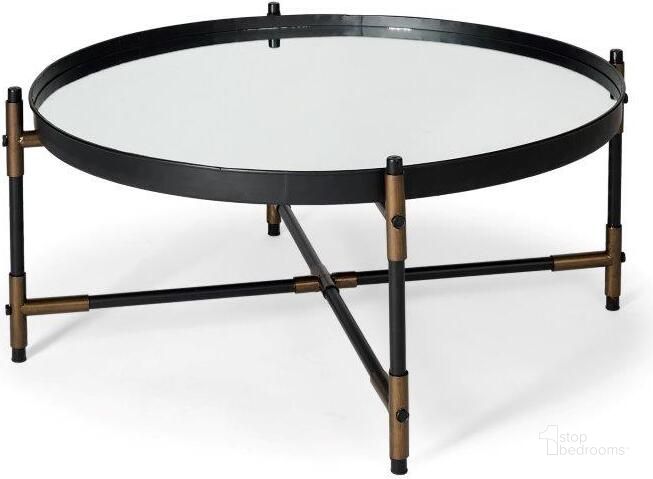 The appearance of Marshall Black Round Mirrored Top With Metal Base Coffee Table designed by Mercana in the modern / contemporary interior design. This black piece of furniture  was selected by 1StopBedrooms from Marshall Collection to add a touch of cosiness and style into your home. Sku: 67043. Material: Metal. Product Type: Coffee Table. Image1