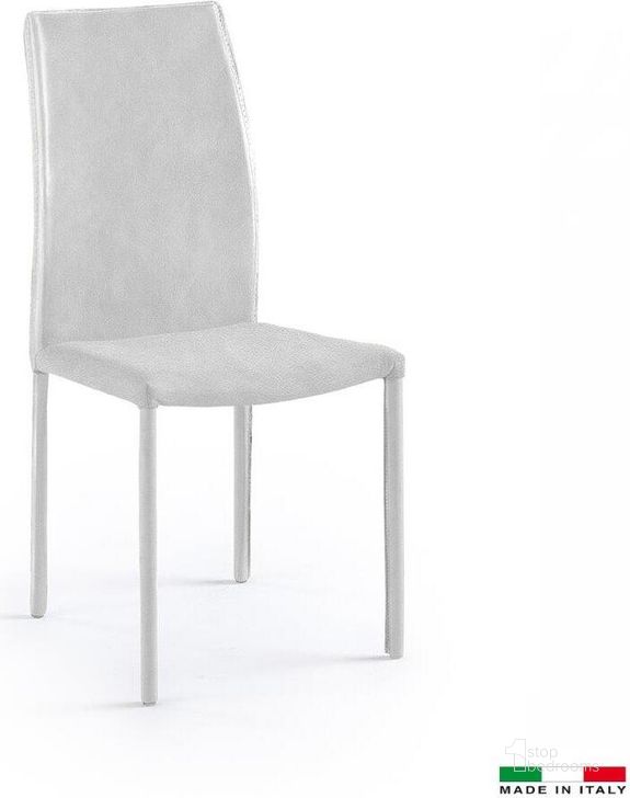 The appearance of Marta Dining Chair In White Set Of 2 designed by Bellini Modern Living in the modern / contemporary interior design. This white piece of furniture  was selected by 1StopBedrooms from Marta Collection to add a touch of cosiness and style into your home. Sku: Marta WHT. Material: Leather. Product Type: Dining Chair. Image1