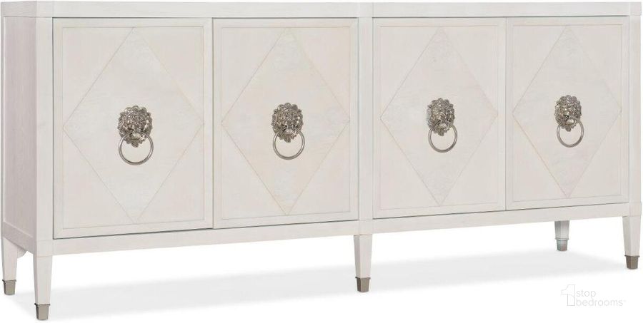 The appearance of Melange Leo Four Door Credenza designed by Hooker in the traditional interior design. This white piece of furniture  was selected by 1StopBedrooms from Melange Collection to add a touch of cosiness and style into your home. Sku: 628-85629-02. Product Type: Credenza. Material: Wood Veneer. Image1