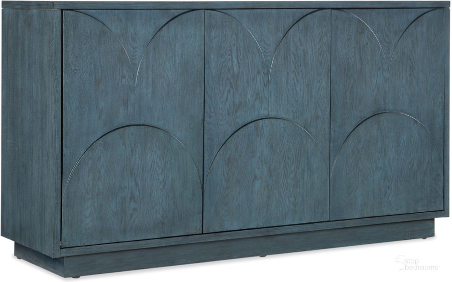 The appearance of Melange Round Valley Three Door Entertainment Credenza In Blue designed by Hooker in the transitional interior design. This blue piece of furniture  was selected by 1StopBedrooms from Melange Collection to add a touch of cosiness and style into your home. Sku: 628-55052-45. Material: Wood. Product Type: Credenza. Image1