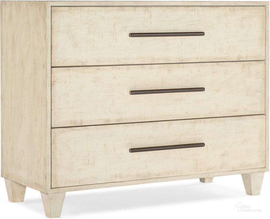 The appearance of Melange Saffron Three Drawer Chest In Beige designed by Hooker in the transitional interior design. This beige piece of furniture  was selected by 1StopBedrooms from Melange Collection to add a touch of cosiness and style into your home. Sku: 628-85652-05. Material: Wood. Product Type: Accent Chest. Image1