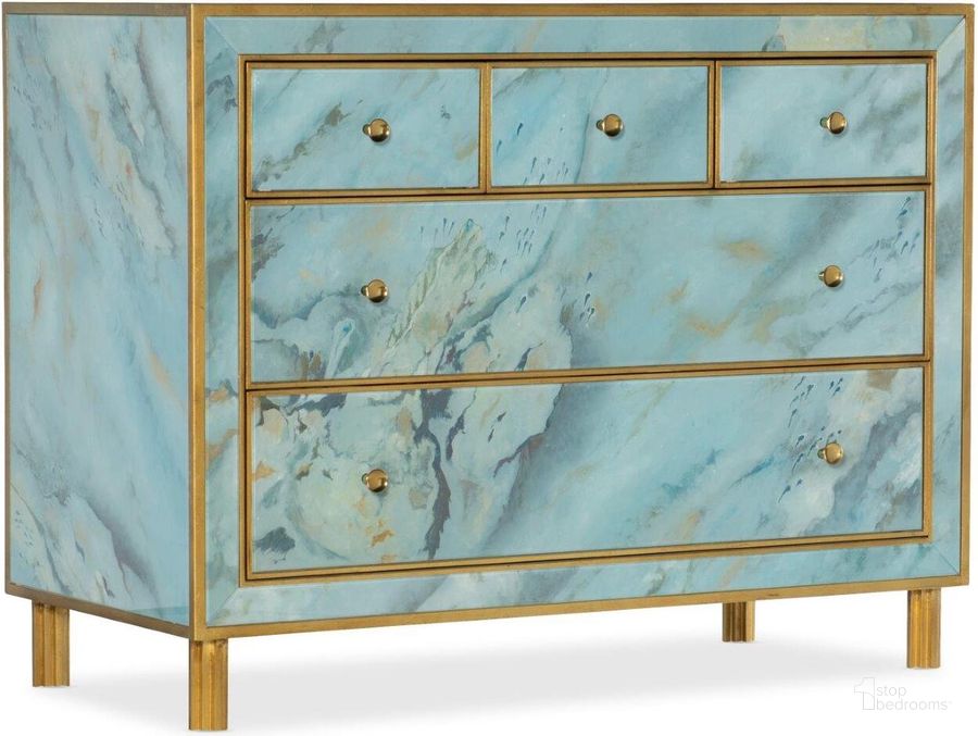 The appearance of Melange Sorrell Five-Drawer Chest designed by Hooker in the transitional interior design. This blue piece of furniture  was selected by 1StopBedrooms from Melange Collection to add a touch of cosiness and style into your home. Sku: 638-85525-00. Material: Glass. Product Type: Accent Chest. Image1