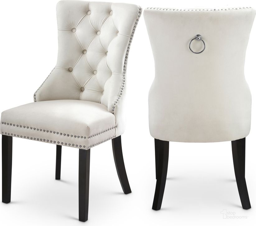 The appearance of Meridian 740CreamC Nikki Series Contemporary Fabric Wood Frame Dining Room Chair Set of 2 designed by Meridian in the modern / contemporary interior design. This cream velvet piece of furniture  was selected by 1StopBedrooms from Nikki Collection to add a touch of cosiness and style into your home. Sku: 740Cream-C. Material: Wood. Product Type: Dining Chair. Image1