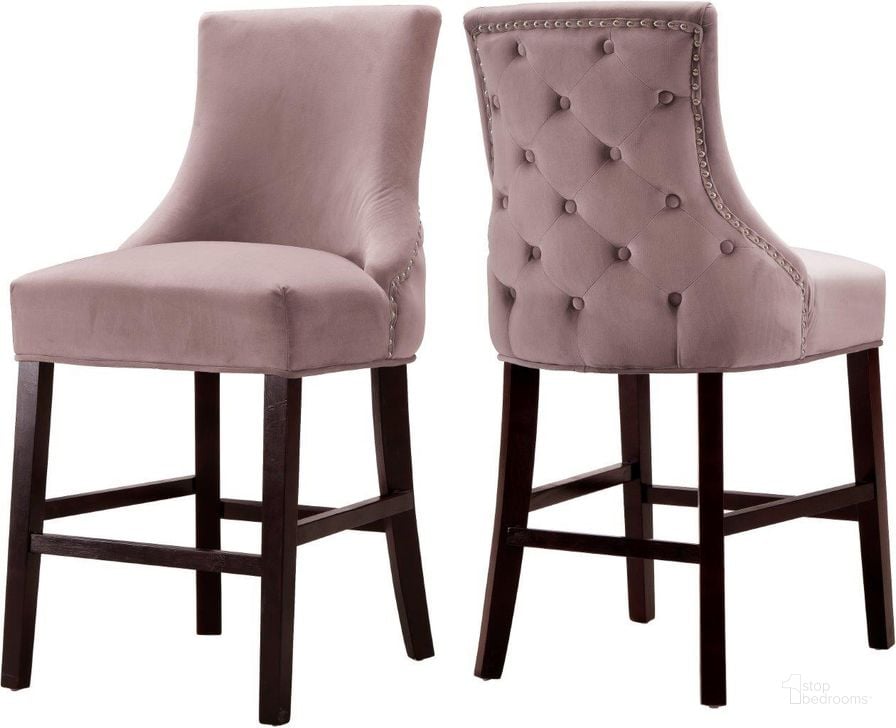 The appearance of Meridian 775PinkC Hannah Series Commercial Velvet Upholstered Bar Stool Set of 2 designed by Meridian in the modern / contemporary interior design. This pink velvet piece of furniture  was selected by 1StopBedrooms from Hannah Collection to add a touch of cosiness and style into your home. Sku: 775Pink-C. Material: Wood. Product Type: Barstool. Image1