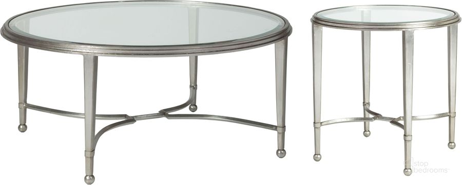 The appearance of Metal Designs Silver Leaf Sangiovese Round Occasional Table Set designed by Artistica Home in the modern / contemporary interior design. This silver piece of furniture  was selected by 1StopBedrooms from Metal Designs Collection to add a touch of cosiness and style into your home. Sku: 01-2011-943-47;01-2011-950-47. Product Type: Occasional Table Set. Image1
