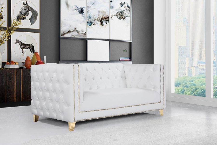 The appearance of Michelle White Faux Leather Loveseat designed by Meridian in the modern / contemporary interior design. This white piece of furniture  was selected by 1StopBedrooms from Michelle Collection to add a touch of cosiness and style into your home. Sku: 651White-L. Material: Faux Leather. Product Type: Loveseat. Image1