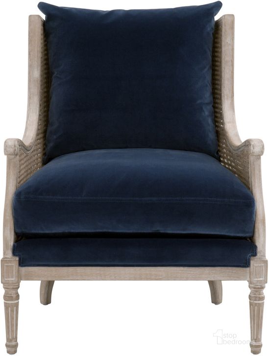 The appearance of Millet Blue Accent Chair designed by Isaac Tahari in the transitional interior design. This blue piece of furniture  was selected by 1StopBedrooms from Millet Collection to add a touch of cosiness and style into your home. Sku: 8213.DEN/NGB. Material: Wood. Product Type: Accent Chair. Image1