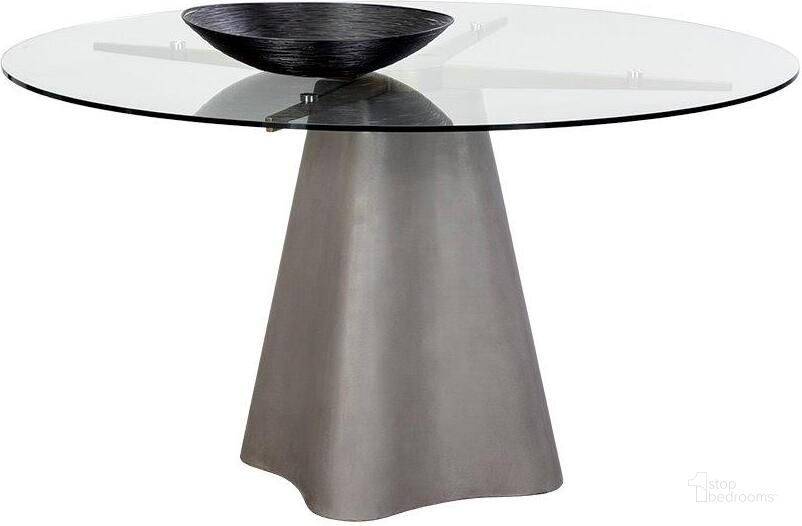 The appearance of Moda 55 Inch Dining Table In Grey designed by Sunpan in the modern / contemporary interior design. This grey piece of furniture  was selected by 1StopBedrooms from Moda Collection to add a touch of cosiness and style into your home. Sku: 108031. Table Base Style: Pedestal. Table Top Shape: Round. Material: Glass. Product Type: Dining Table. Size: 55". Image1