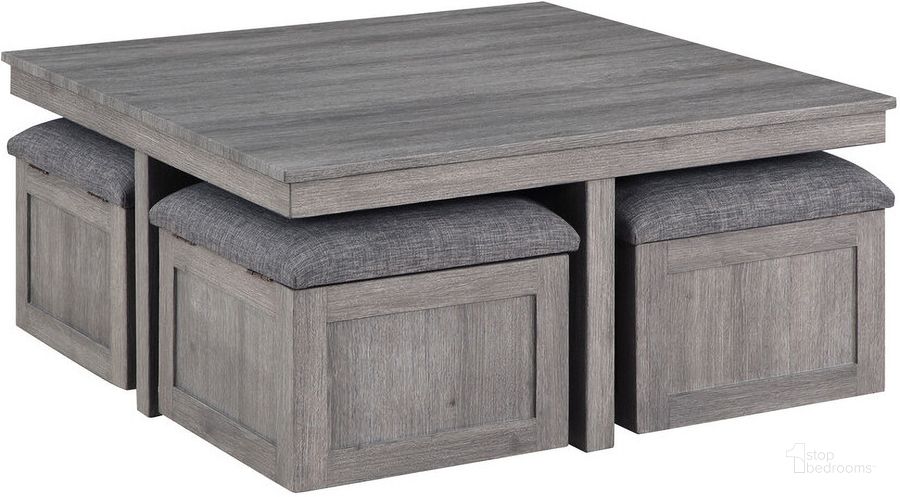 The appearance of Moseberg Distressed Gray Coffee Table With Storage Stools designed by Lilola Home in the modern / contemporary interior design. This distressed gray piece of furniture  was selected by 1StopBedrooms from Moseberg Collection to add a touch of cosiness and style into your home. Sku: 98011. Product Type: Coffee Table. Material: Rubberwood. Image1