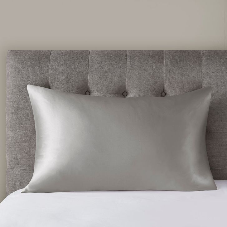 The appearance of Mulberry Silk Queen Pillowcase In Grey designed by Olliix in the transitional interior design. This grey piece of furniture  was selected by 1StopBedrooms from Silk Collection to add a touch of cosiness and style into your home. Sku: MP21-7273. Material: Fabric. Bed Size: Queen. Product Type: Pillow Cover. Image1