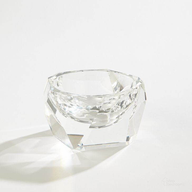 The appearance of Multi Facet Crystal Small Bowl In Clear designed by Global Views in the modern / contemporary interior design. This clear piece of furniture  was selected by 1StopBedrooms from Multi Collection to add a touch of cosiness and style into your home. Sku: 8.83026. Product Type: Bowl. Material: Crystal. Image1