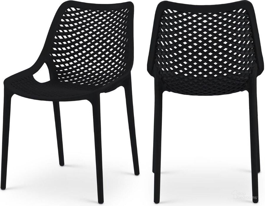 The appearance of Mykonos Black Outdoor Patio Dining Chair Set of 4 designed by Meridian in the modern / contemporary interior design. This black piece of furniture  was selected by 1StopBedrooms from Mykonos Collection to add a touch of cosiness and style into your home. Sku: 328Black. Material: Polypropylene. Product Type: Outdoor Dining Chair. Image1